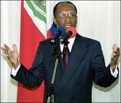 Haitian President Jean Bertrand Aristide addresses a press conference in Port-au-Prince
