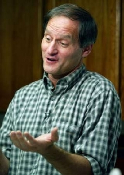 Michael Newdow, an emergency room doctor who pleaded his own case that resulted in the Pledge of Allegiance being called unconstitutional, talks about the Pledge of Allegiance at his home in Sacramento, California, in this June 27, 2002 file photo. Newdow, a California atheist who in 2004 lost his Supreme Court fight to remove the phrase 'under God' from the Pledge, on September 14, 2005 won an initial round as he sought to revive his cause in the courts. A U.S. district court rejected a motion to dismiss his case to get the words excised from the pledge, recited by millions of schoolchildren every day, citing the precedent of an earlier ruling by the U.S. 9th Circuit Court of Appeals. REUTERS/Susan Ragan