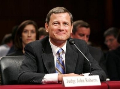 Federal judge John Roberts, President Bush's first nominee to the Supreme Court, won Senate confirmation on Thursday as the 17th chief justice of the United States. Roberts is seen during the third day of his confirmation hearing on Capitol Hill in Washington September 14, 2005. (Photo: Kevin Lamarque / Reuters)