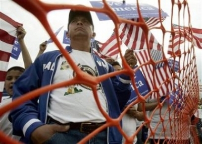A supporter of immigration rights takes part in a rally in Washington, May 17, 2006. A