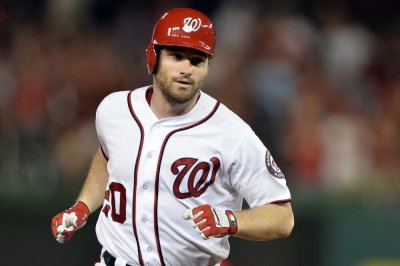 Washington Nationals second baseman Daniel Murphy (20) rounds the base after a solo home run during the fifth inning against the Colorado Rockies at Nationals Park, Washington, D.C. August 26, 2016.