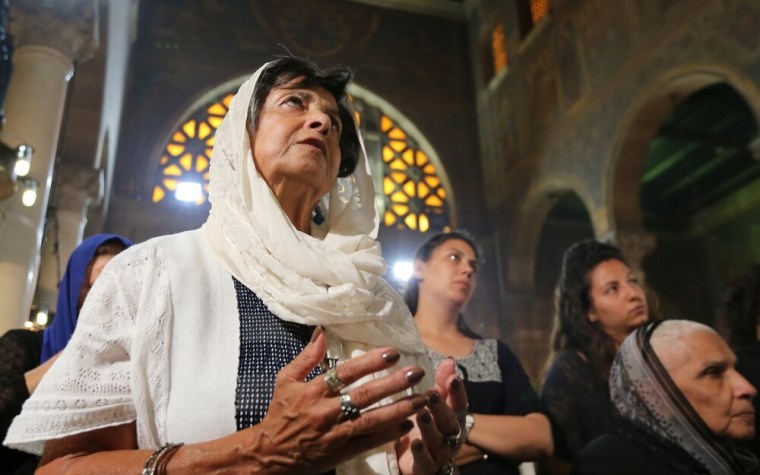 Relatives of the Christian victims of the crashed EgyptAir flight MS804 attend an absentee funeral mass at the main Cathedral in Cairo, Egypt on May 22, 2016.