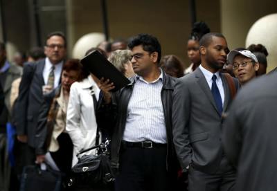 Job seekers stand in line to meet with prospective employers at a career fair in New York City, October 24, 2012. Nationally in the U.S. unemployment rates fell in 41 states from August to September the U.S. Bureau of Labor Statistics reported in its last look at joblessness before the November 6 election.