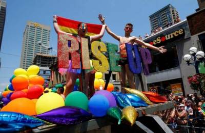 Revelers celebrate during the'' WorldPride'' gay pride Parade in Toronto, June 29, 2014.