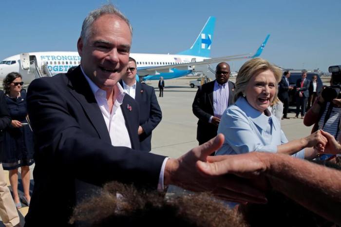 Vice-presidential candidate and U.S. Senator Tim Kaine and U.S. Democratic presidential nominee Hillary Clinton (R) greet well-wishers in Cleveland, Ohio, U.S., September 5, 2016.