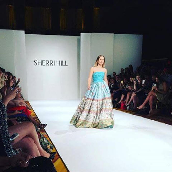 Natasha Bure walks the runway at Sherri Hill's fashion show, September 12, 2016.
