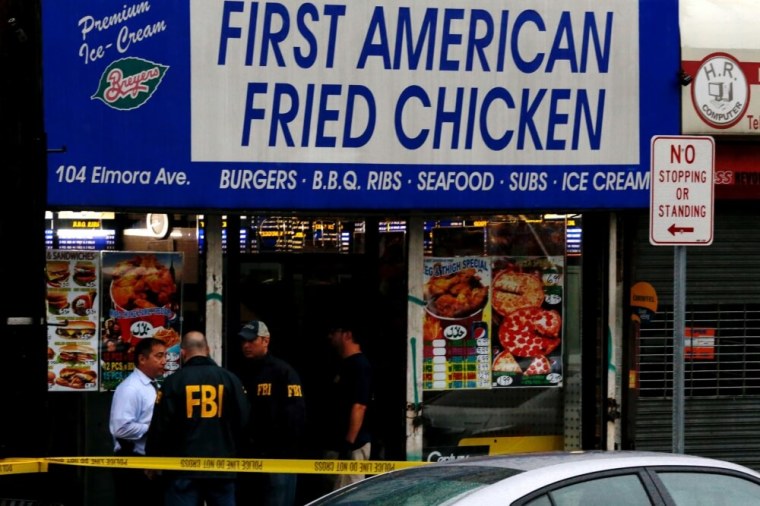 FBI personnel search an address during an investigation into Ahmad Khan Rahami, who was wanted for questioning in an explosion in New York, which authorities believe is linked to the explosive devices found in New Jersey, in Elizabeth, September 19, 2016.