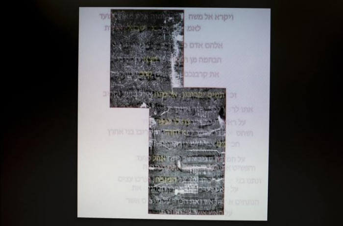 Writings, believed to be ancient Hebrew script from the bible, is displayed on a computer screen at the Israel Museum in Jerusalem July 20, 2015.