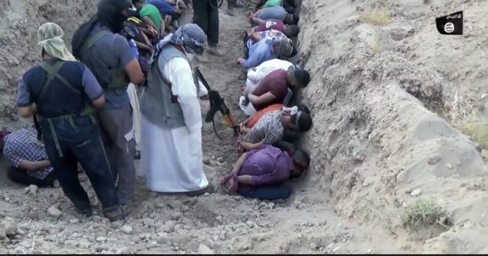 ISIS fighters carrying out executions of prisoners in Iraq in 'Hell of the Apostates' video, shared in September, 2016.