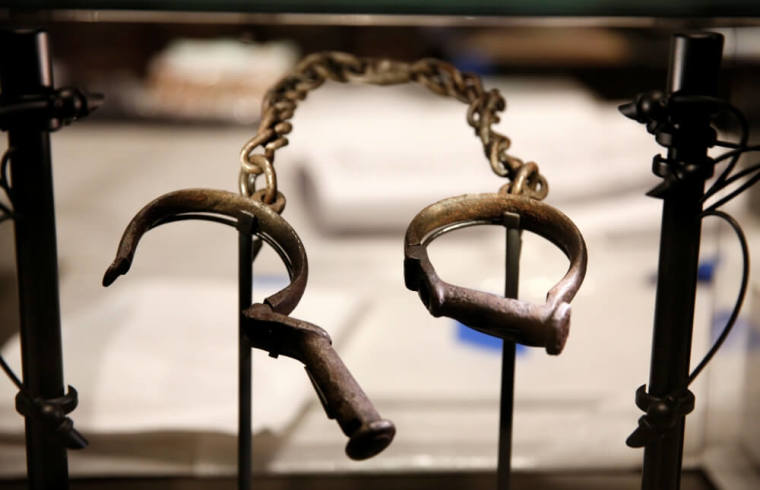 Slave shackles are seen in a display case during a media preview at the National Museum of African American History and Culture on the National Mall in Washington September 14, 2016. The museum will open to the public on September 24.
