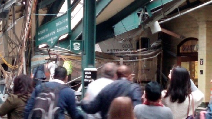 Onlookers view a New Jersey Transit train that derailed and crashed through the station in Hoboken, New Jersey, in this picture courtesy of Chris Lantero taken September 29, 2016.