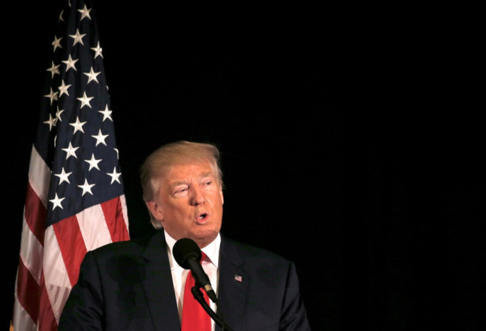 Republican presidential nominee Donald Trump speaks at the 'Retired American Warriors' conference during a campaign stop in Herndon, Virginia, U.S., October 3, 2016.
