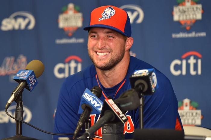 New York Mets outfielder Tim Tebow (15) speaks with the media after his workout at the Mets Minor League Complex, Port St. Lucie, Florida, September 20, 2016;