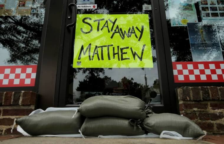 Sandbags are seen in front of a business ahead of Hurricane Matthew in Georgetown, South Carolina, October 6, 2016.