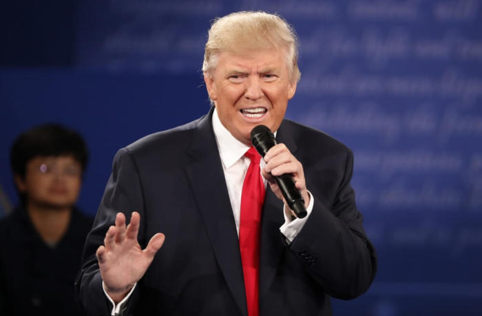 Republican U.S. presidential nominee Donald Trump speaks during the presidential town hall debate with Democratic U.S. presidential nominee Hillary Clinton (not pictured) at Washington University in St. Louis, Missouri, U.S., October 9, 2016.