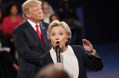 Democratic U.S. presidential nominee Hillary Clinton speaks during their presidential town hall debate with Republican U.S. presidential nominee Donald Trump at Washington University in St. Louis, Missouri, U.S., October 9, 2016.