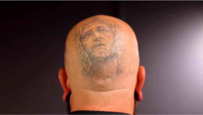 Las Vegas tattoo artist Chance Gomez showing one of his tattoos of Jesus in a video.