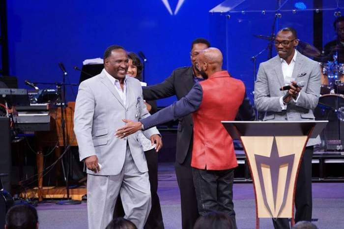 An emaciated Bishop Eddie Long (red jacket) greets senior leaders at New Birth Missionary Baptist Church in Lithonia, Georgia, in October 2016.