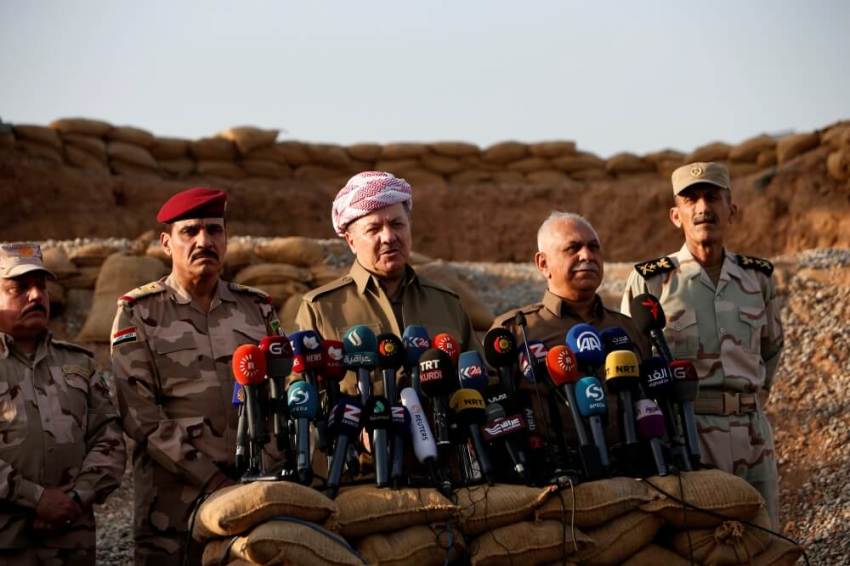 Iraq's Kurdistan region's President Massoud Barzani (C) speaks during a news conference on the outskirts of Mosul, Iraq, October 17, 2016.