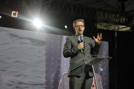 The Rev. Dr. McKenzie "Mac" Pier, founder and CEO of The New York Leadership Center welcomes attendees at the Jacob Javits Center in Manhattan, New York on Tuesday October 25, 2016 on the opening day of Movement Day Global Cities.