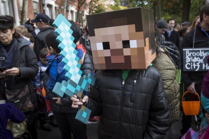 A child dressed as a character from Minecraft takes part in the Children's Halloween day parade at Washington Square Park in the Manhattan borough of New York, October 31, 2015.