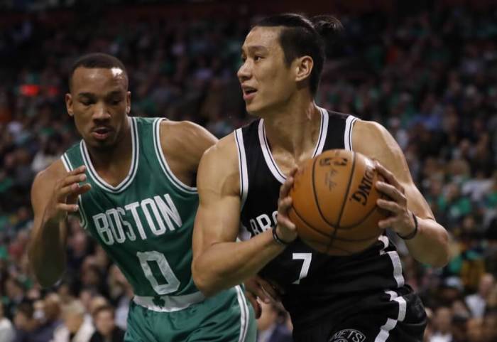 Brooklyn Nets guard Jeremy Lin (7) works the ball against Boston Celtics guard Avery Bradley (0) in the second quarter at TD Garden in Boston, Massachusetts, October 26, 2016.