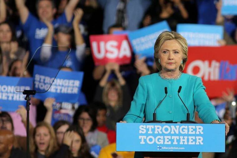 U.S. Democratic presidential nominee Hillary Clinton pauses as she speaks during a campaign rally in Cleveland, Ohio, November 6, 2016.