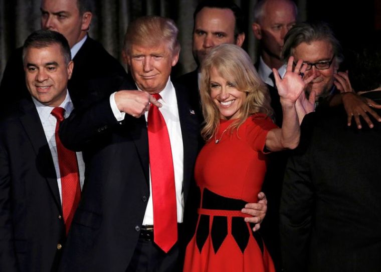 Donald Trump and his campaign manager Kellyanne Conway greet supporters during his election night rally in Manhattan, New York, November 8, 2016.