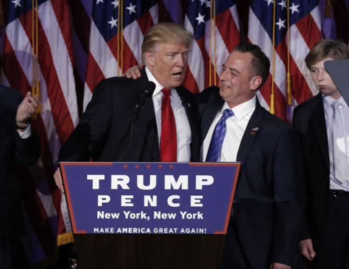 U.S. President-elect Donald Trump and Chairman of the Republican National Committee Reince Priebus (R) address supporters during his election night rally in Manhattan, New York, U.S. on November 9, 2016.