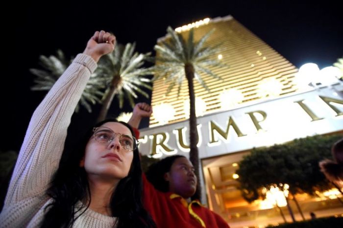 Demonstrators chant in protest against the election of Republican Donald Trump as President of the United States, at the Trump International Hotel & Tower in Las Vegas, Nevada, U.S. November 12, 2016.