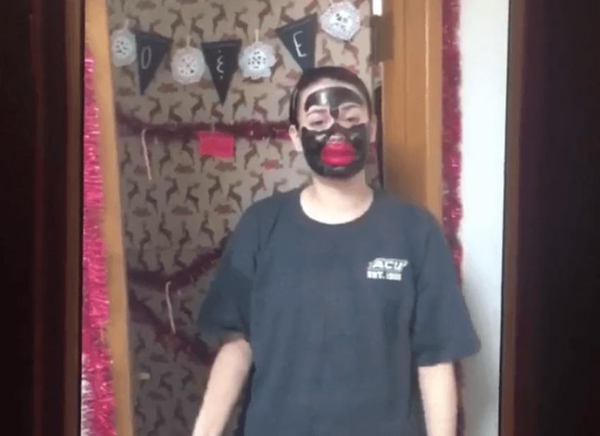 A white female student at Abilene Christian University wears black makeup while mocking a "strong black woman" on Twitter.