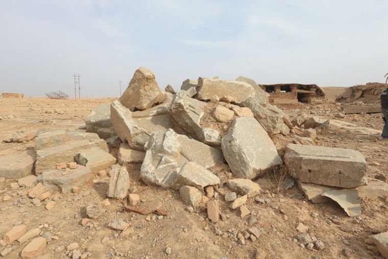 Remains of wall panels, destroyed by Islamic State militants are seen in the Assyrian city of Nimrud eastern bank of the Tigris River.