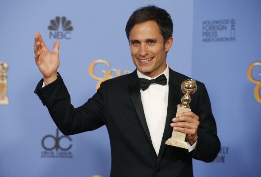 Actor Gael Garcia Bernal poses backstage with the award for Best Performance by an Actor in a Television Series - Musical or Comedy for his role in "Mozart in the Jungle" at the 73rd Golden Globe Awards in Beverly Hills, California, January 10, 2016.