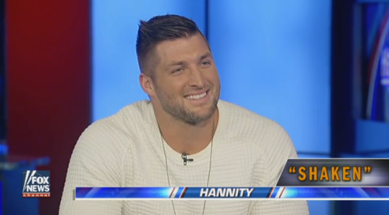 Tim Tebow speaks about his new book, 'Shaken' with Fox News host Sean Hannity in New York City on November 28, 2016.