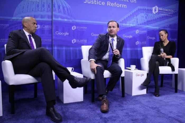 Utah Sen. Mike Lee (M), New Jersey Sen. Cory Booker (L) and Google's public policy and government relations senior counsel Malika Saada Saar (R) participate in a panel discussion on criminal justice reform at Google's Washington, D.C. office on Dec. 1, 2016.