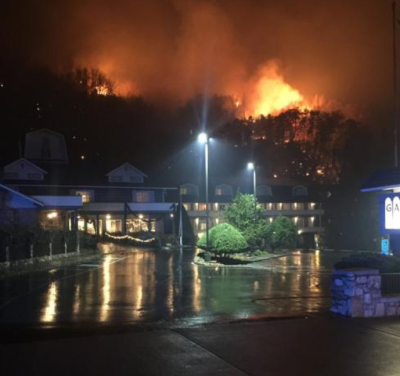 A wildfire burns on a hillside after a mandatory evacuation was ordered in Gatlinburg, Tennessee in a picture released November 30, 2016.