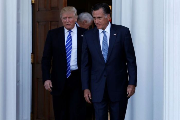 U.S. President-elect Donald Trump (L) and former Massachusetts Governor Mitt Romney emerge after their meeting at the main clubhouse at Trump National Golf Club in Bedminster, New Jersey, U.S., November 19, 2016.