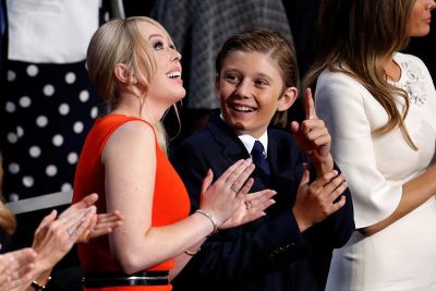 Son of Republican presidential candidate Donald Trump, Barron Trump (R) and half sister Tiffany Trump point up and speak at the Republican National Convention in Cleveland, Ohio, July 21, 2016.