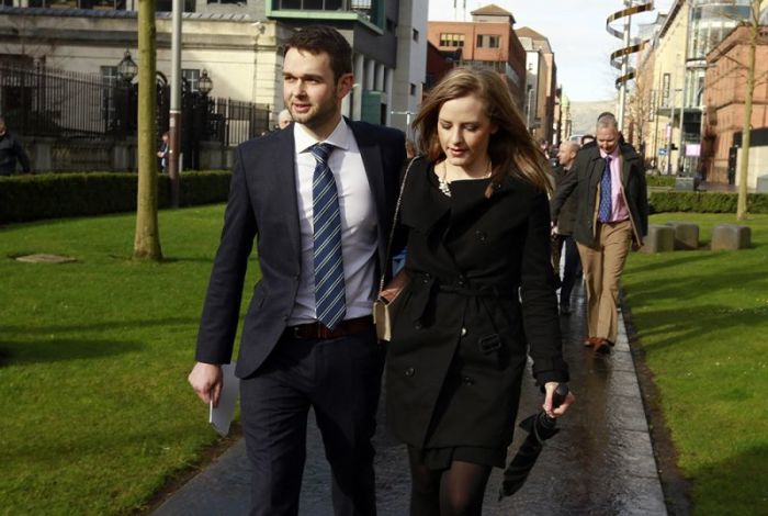 Daniel McArthur (C) general manager of Ashers bakery involved in a 'gay cake' legal dispute walks with his wife Amy outside Laganside court in Belfast. March 26, 2015. Ashers refused to make a cake bearing a pro-gay marriage slogan on it which was to be given to Andrew Muir, Northern Ireland's first openly gay mayor. The bakers refused to make the cake on the grounds that it contradicted their religious beliefs according to local media.