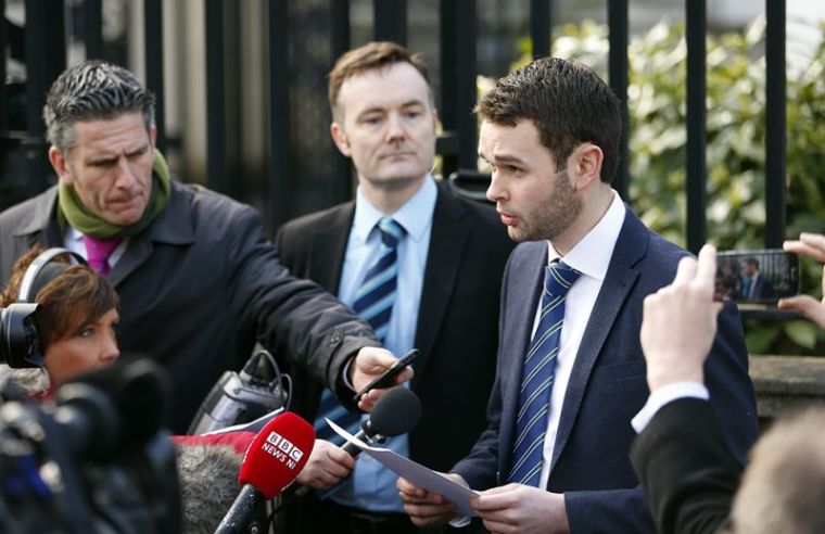 Daniel McArthur (C) general manager of Ashers bakery involved in a 'gay cake' legal dispute speaks to the media outside Laganside court in Belfast. March 26, 2015. Ashers refused to make a cake bearing a pro-gay marriage slogan on it which was to be given to Andrew Muir, Northern Ireland's first openly gay mayor. The bakers refused to make the cake on the grounds that it contradicted their religious beliefs according to local media.