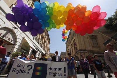Supporters and members of the lesbian, gay, bisexual and transgender community take part in a gay pride parade organised by the Malta Gay Rights Movement in Valletta June 22, 2013.