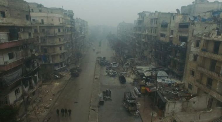 A still image from video taken December 13, 2016 of a general view of bomb damaged eastern Aleppo, Syria in the rain. Video released December 13, 2016.