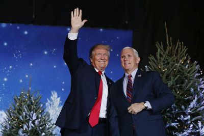 U.S. Vice President-elect Mike Pence (R) introduces U.S. President-elect Donald Trump during a USA Thank You Tour event in Orlando, Florida, December 16, 2016.