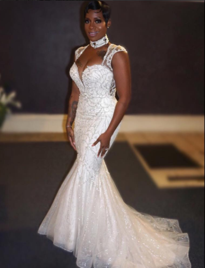 Fantasia Barrino renews her vows to her husband in a ceremony, December 25, 2016.