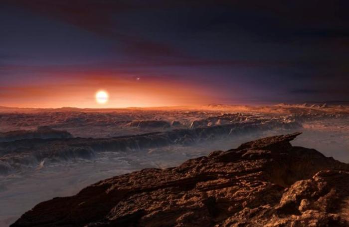 A view of the surface of the planet Proxima b orbiting the red dwarf star Proxima Centauri, the closest star to our Solar System, is seen in an undated artist's impression released by the European Southern Observatory August 24, 2016.