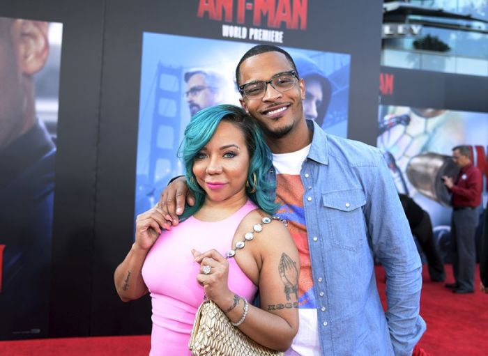Cast member and rapper T.I. (R) and his wife Tameka 'Tiny' Harris pose during premiere of Marvel's 'Ant-Man' in Hollywood, California June 29, 2015.