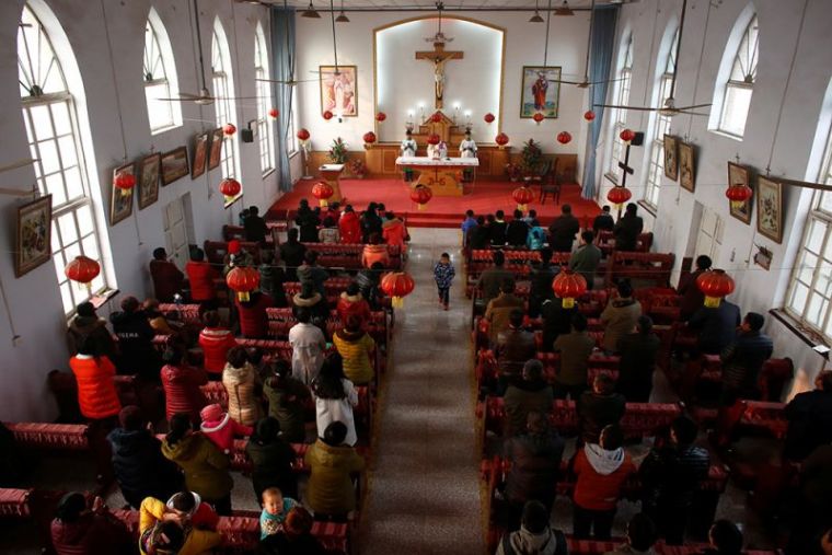 Believers attend a service at the unofficial catholic church in Majhuang village, Hebei Province, China, December 11, 2016.