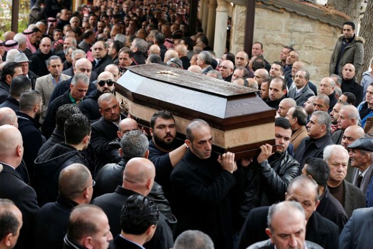 Relatives and friends of Nawras Assaf, one of the victims from Istanbul's New Year nightclub attack, carry his body during his funeral in the town of Al-Fuheis near Amman, Jordan, January 3, 2017.