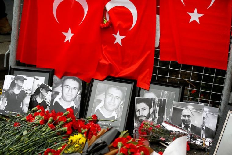 Flowers and pictures of the victims are placed near the entrance of Reina nightclub, which was attacked by a gunman, in Istanbul, Turkey, January 3, 2017.