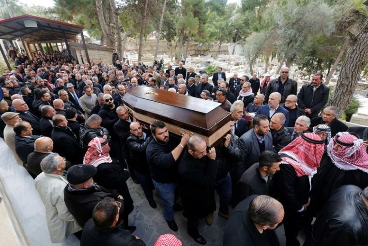 Relatives and friends of Nawras Assaf, one of the victims from Istanbul's New Year nightclub attack, carry his body during his funeral in the town of Al-Fuheis near Amman, Jordan, January 3, 2017.